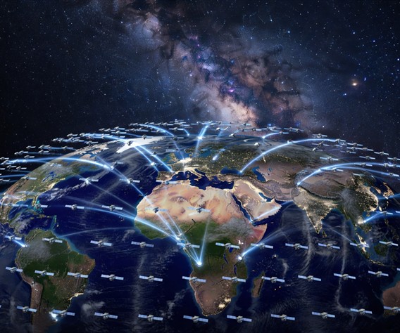 Epic photorealistic visualization of thousands of small LEO satellites forming a dense luminous web around Earth as seen from low orbit, blue-white signal beams connecting satellites to ground terminals across Africa, Asia, and the Americas, ultra-detailed Earth surface with city lights visible below, deep space background with the Milky Way, cinematic wide-angle composition, 8K resolution scientific illustration style